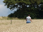 FZ030667 Jenni walking through wheat field.jpg